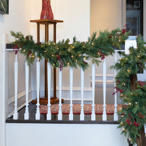The Coordinated Christmas: Garland, Wreaths, and Window Candles as One Look